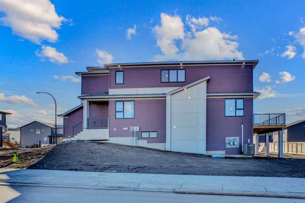 MLS® A2257129 - 305 lucas Place NW in Livingston Calgary, Residential