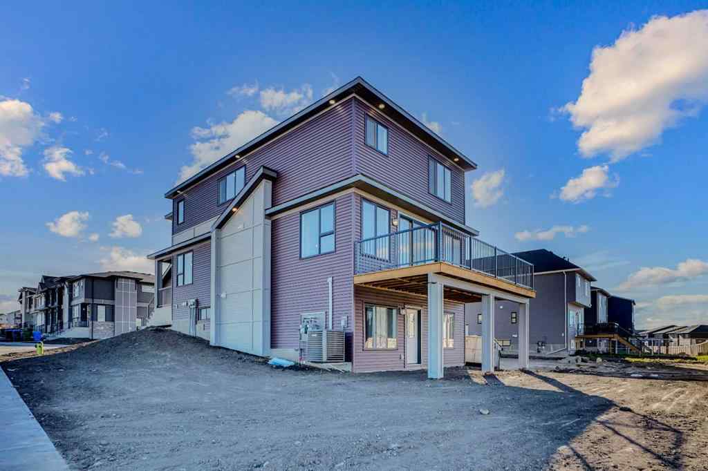 MLS® A2257129 - 305 lucas Place NW in Livingston Calgary, Residential
