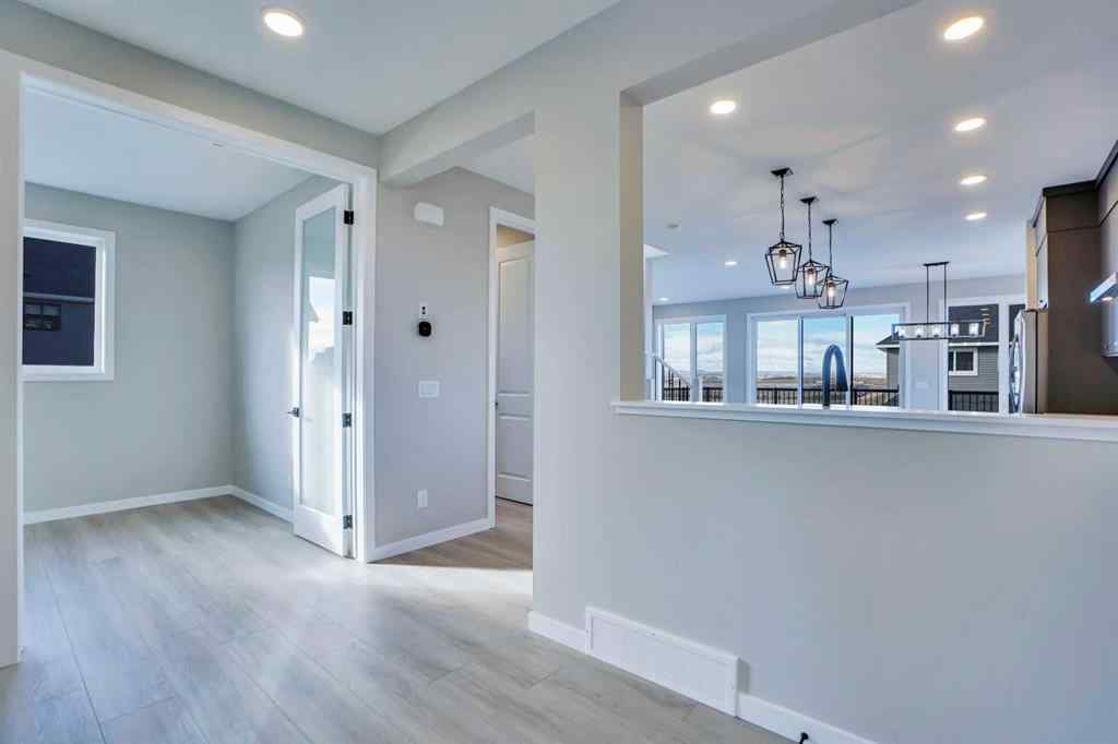 MLS® A2257129 - 305 lucas Place NW in Livingston Calgary, Residential