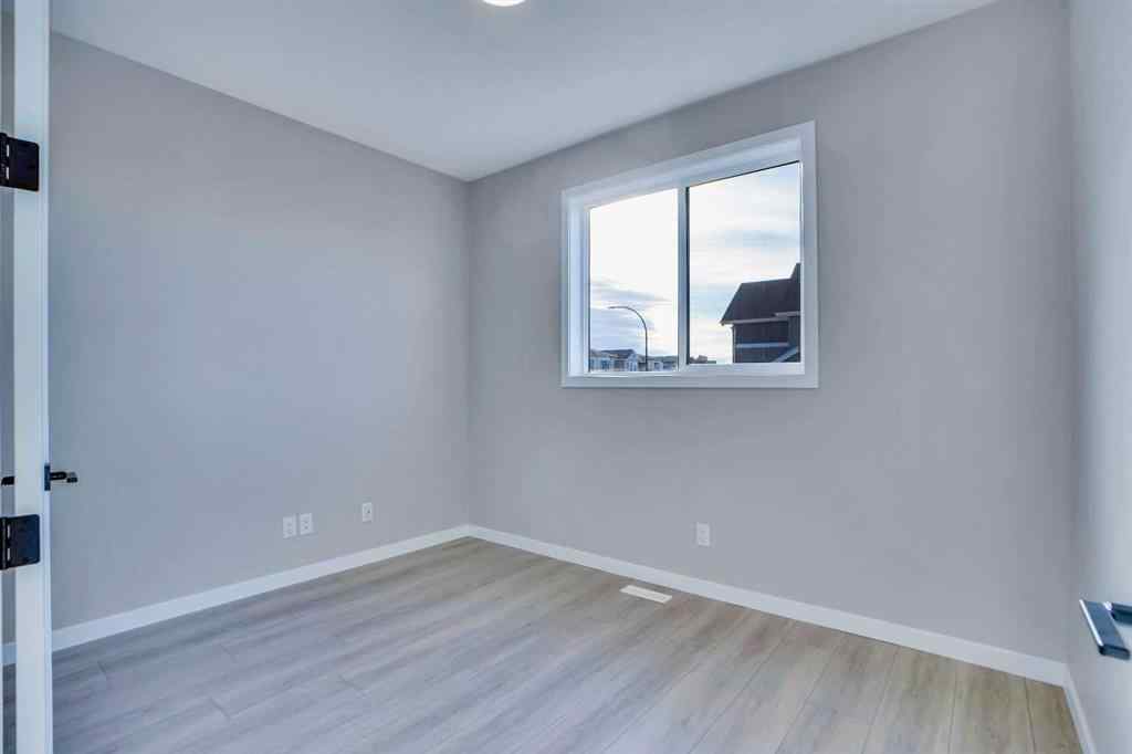 MLS® A2257129 - 305 lucas Place NW in Livingston Calgary, Residential