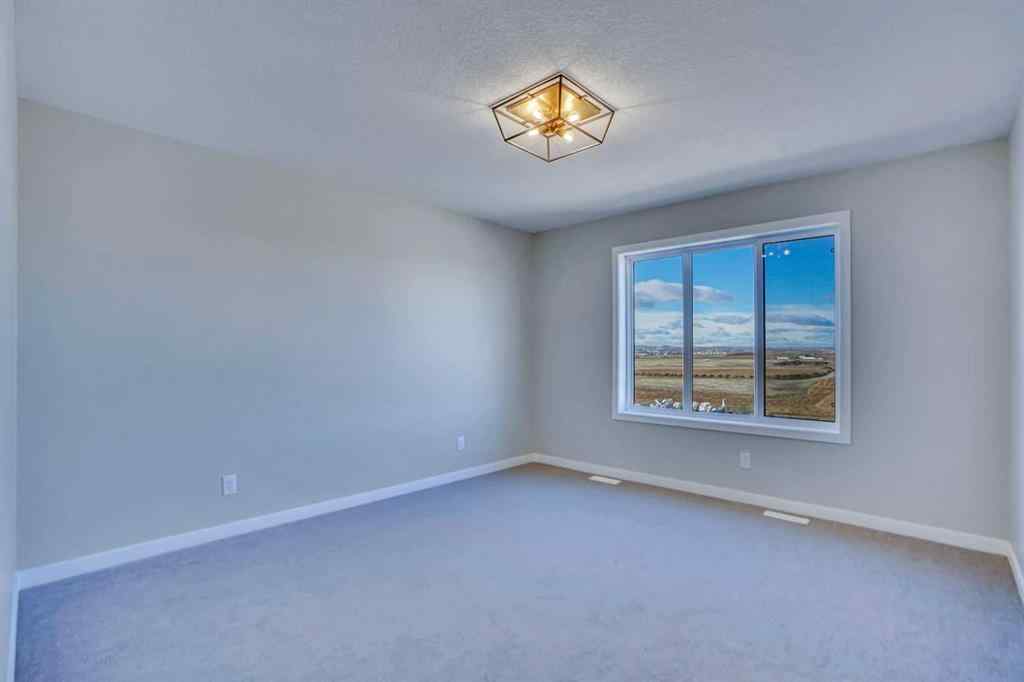 MLS® A2257129 - 305 lucas Place NW in Livingston Calgary, Residential
