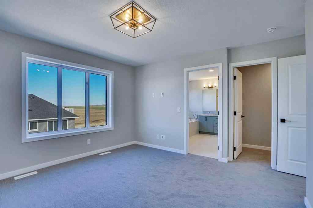 MLS® A2257129 - 305 lucas Place NW in Livingston Calgary, Residential