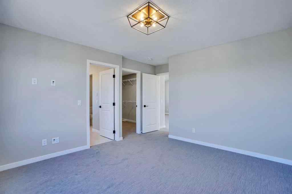 MLS® A2257129 - 305 lucas Place NW in Livingston Calgary, Residential