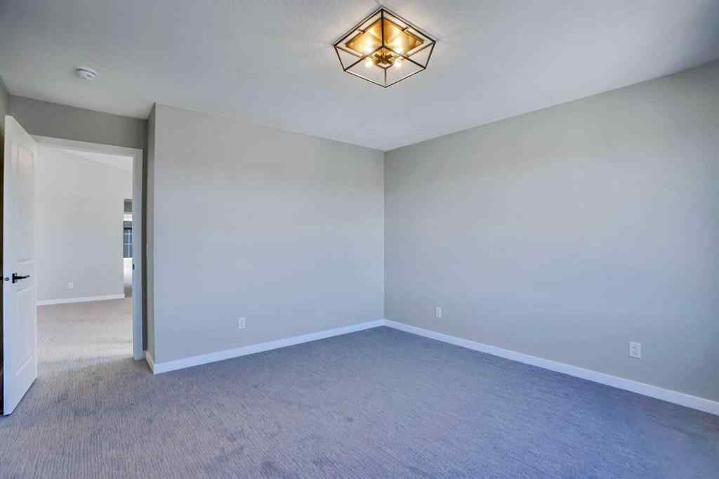 MLS® A2257129 - 305 lucas Place NW in Livingston Calgary, Residential