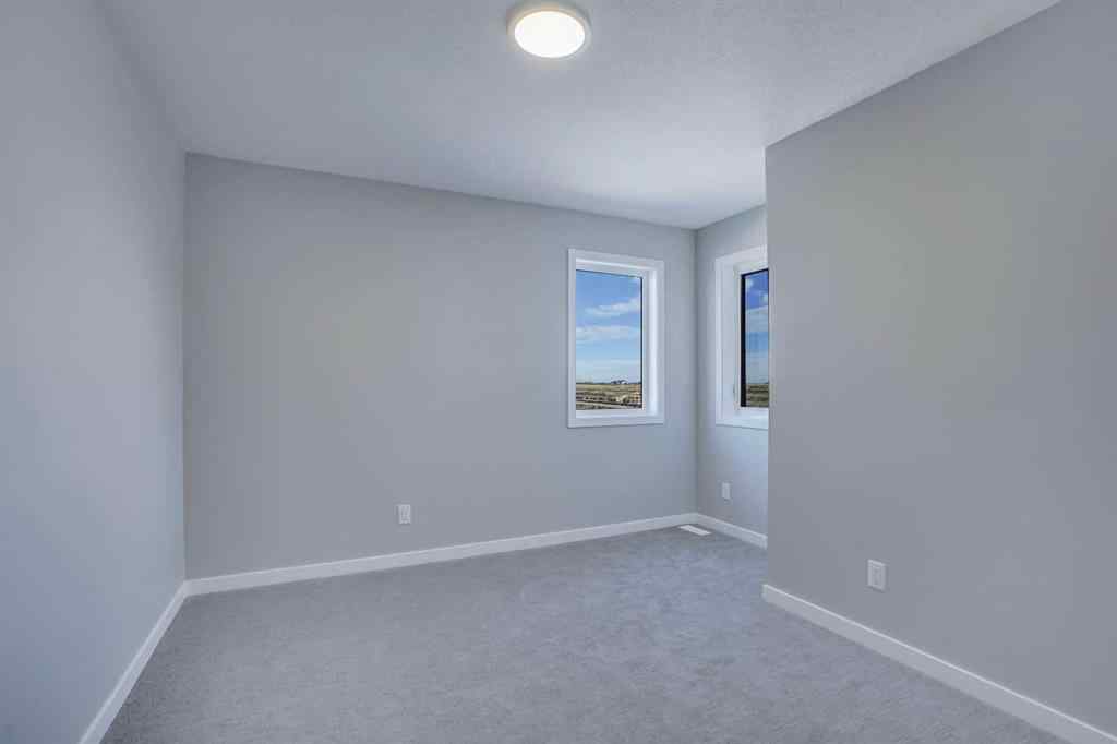 MLS® A2257129 - 305 lucas Place NW in Livingston Calgary, Residential
