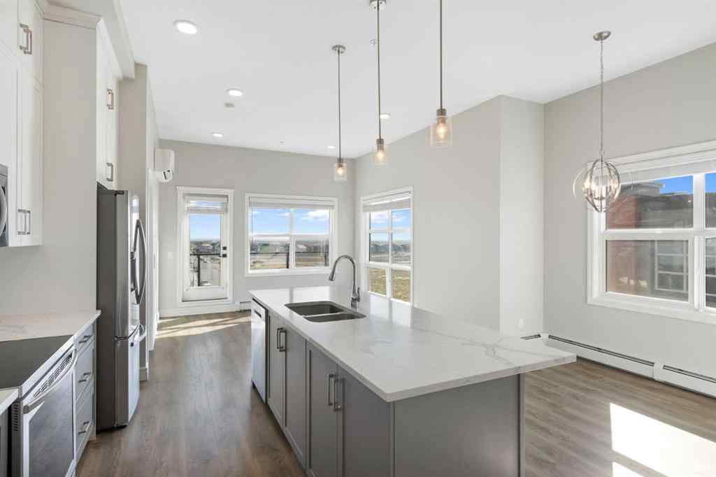 MLS® A2257138 - Unit #405 19661 40 Street SE in Seton Calgary, Residential