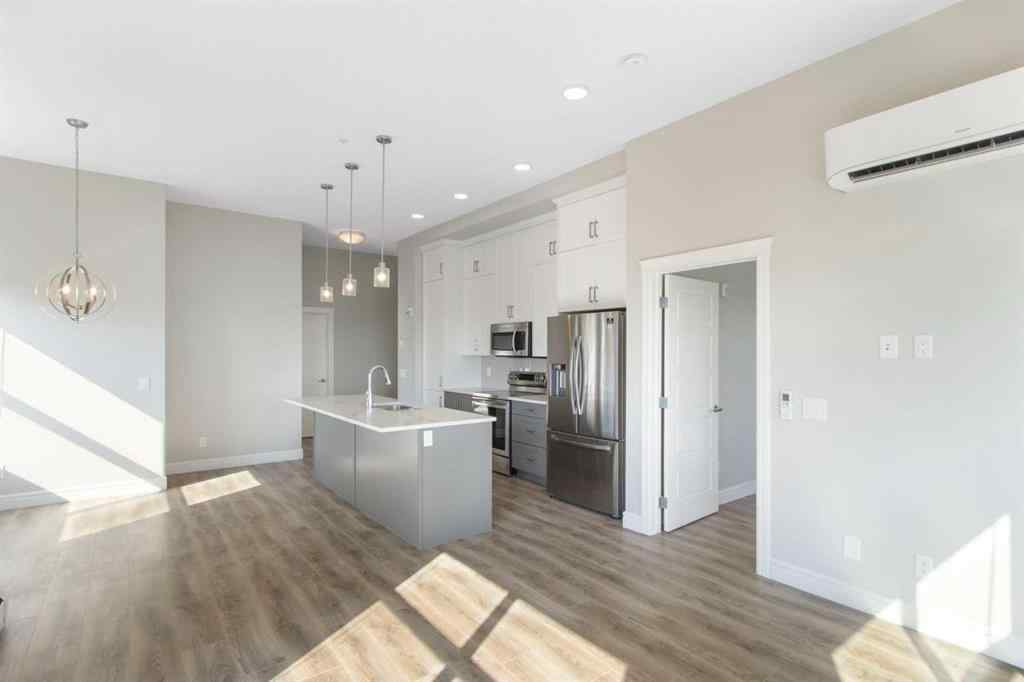 MLS® A2257138 - Unit #405 19661 40 Street SE in Seton Calgary, Residential