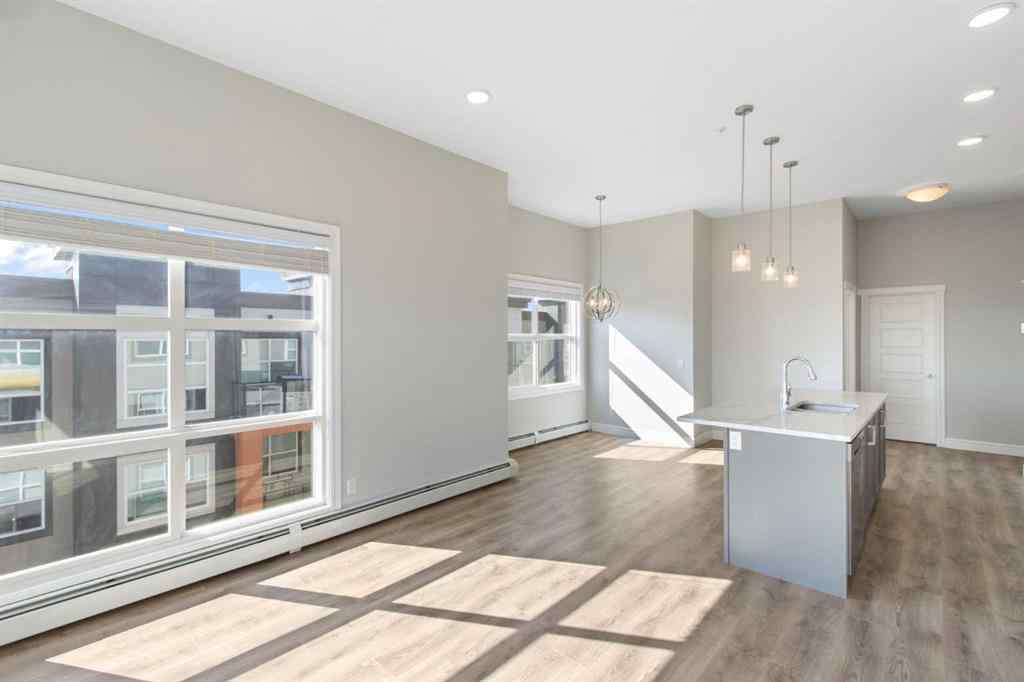 MLS® A2257138 - Unit #405 19661 40 Street SE in Seton Calgary, Residential