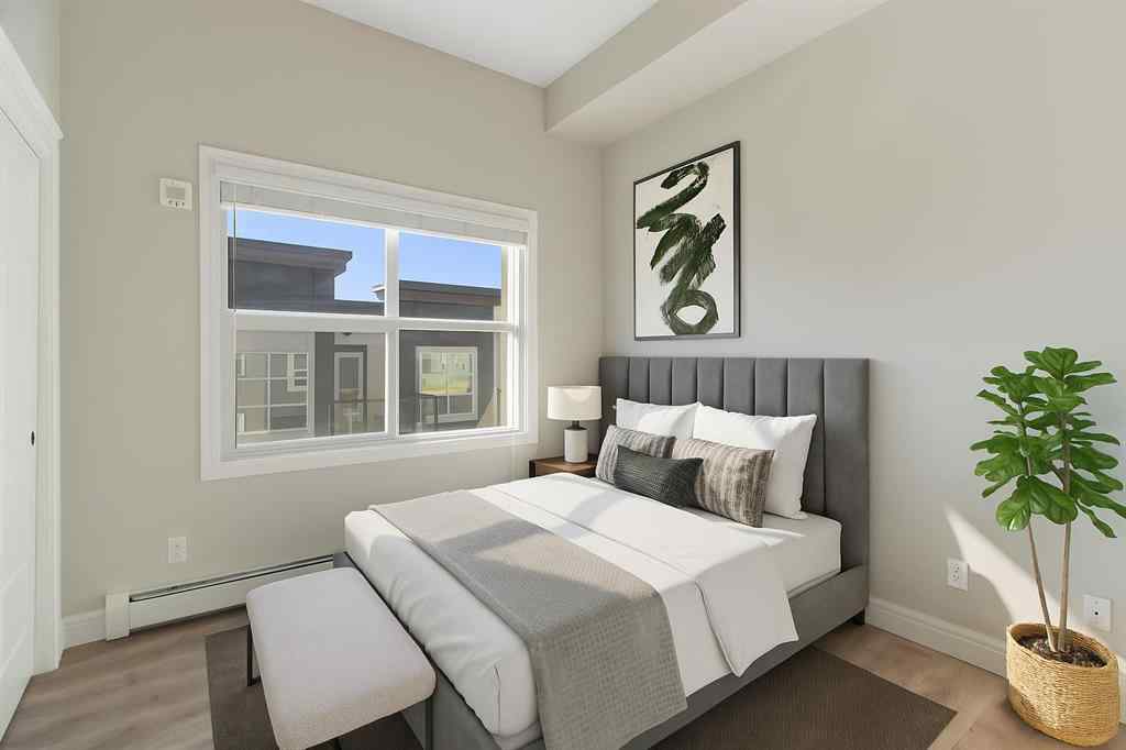 MLS® A2257138 - Unit #405 19661 40 Street SE in Seton Calgary, Residential