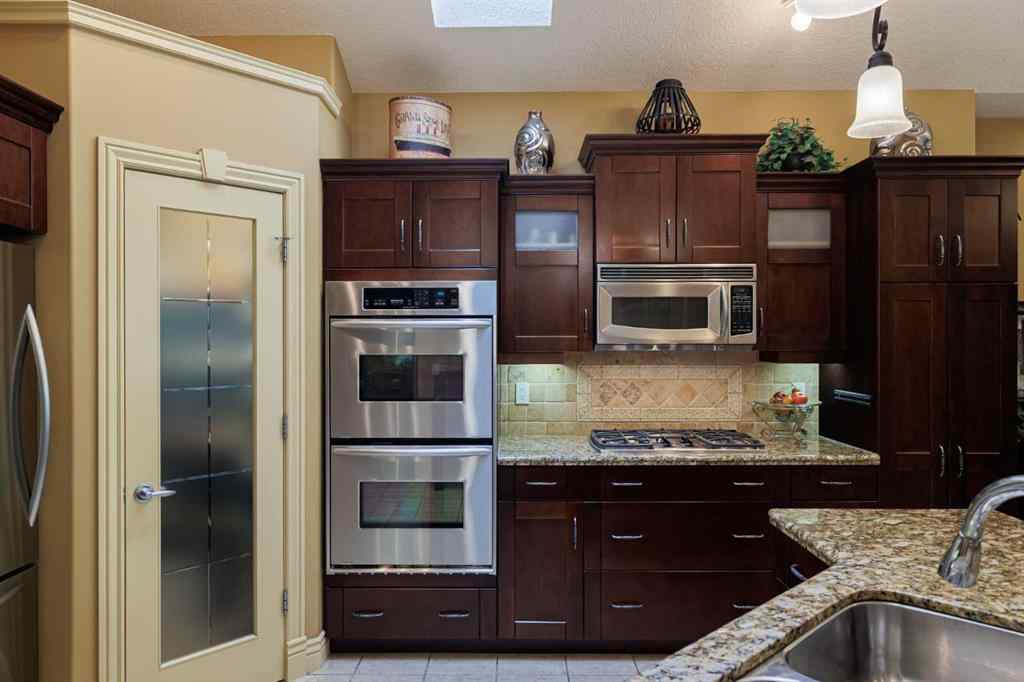 MLS® A2257152 - 38 Tuscany Glen Park NW in Tuscany Calgary, Residential