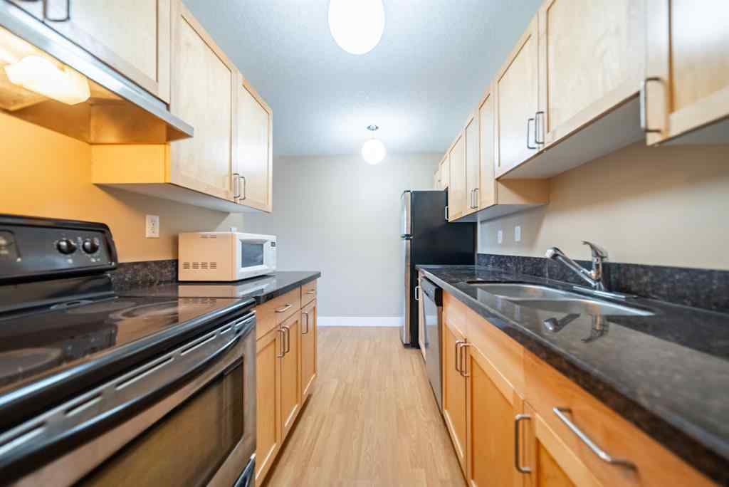 MLS® A2257192 - Unit #104 927 2 Avenue NW in Sunnyside Calgary, Residential