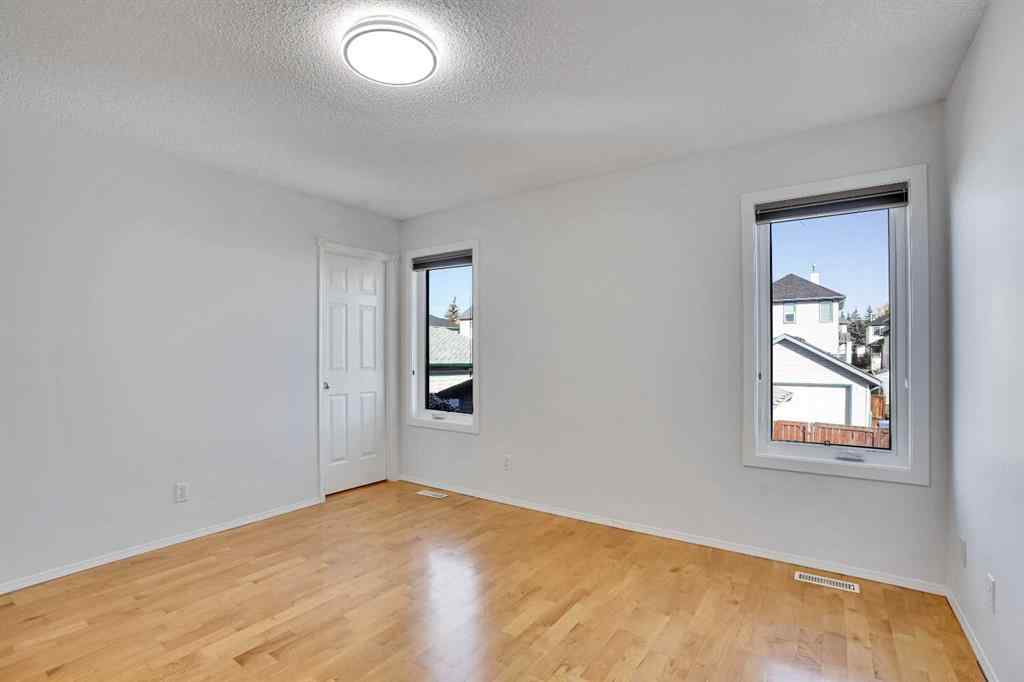 MLS® A2257219 - 307 Arbour Grove Close NW in Arbour Lake Calgary, Residential