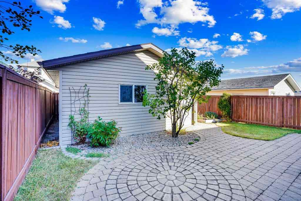 MLS® A2257219 - 307 Arbour Grove Close NW in Arbour Lake Calgary, Residential