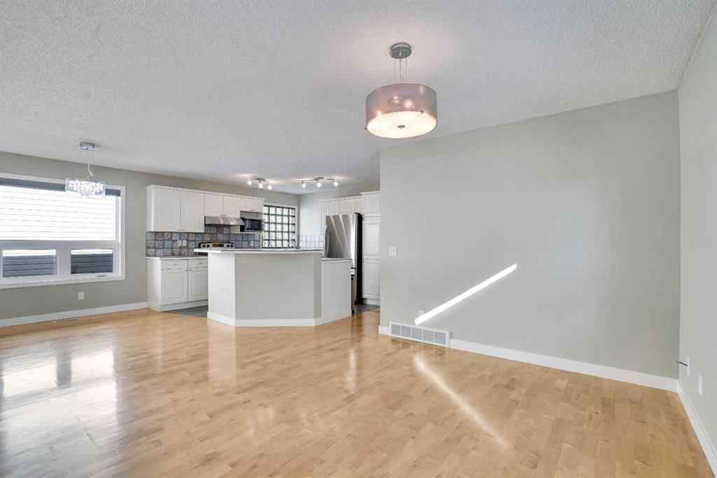MLS® A2257219 - 307 Arbour Grove Close NW in Arbour Lake Calgary, Residential