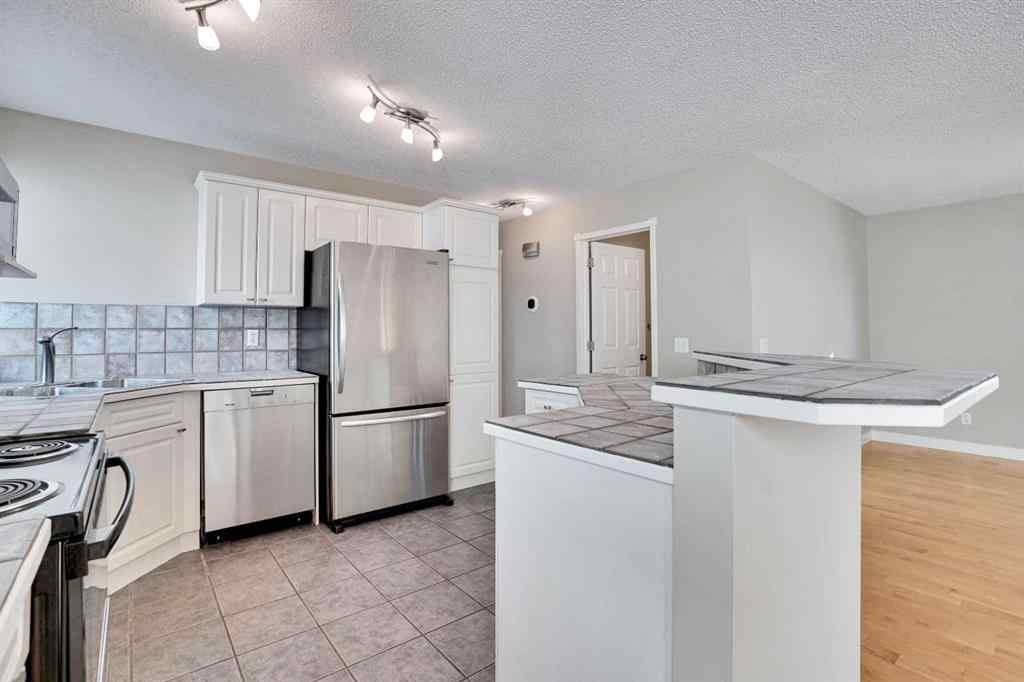 MLS® A2257219 - 307 Arbour Grove Close NW in Arbour Lake Calgary, Residential