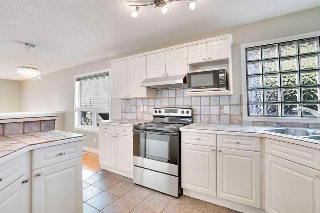 MLS® A2257219 - 307 Arbour Grove Close NW in Arbour Lake Calgary, Residential