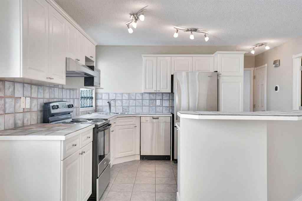 MLS® A2257219 - 307 Arbour Grove Close NW in Arbour Lake Calgary, Residential