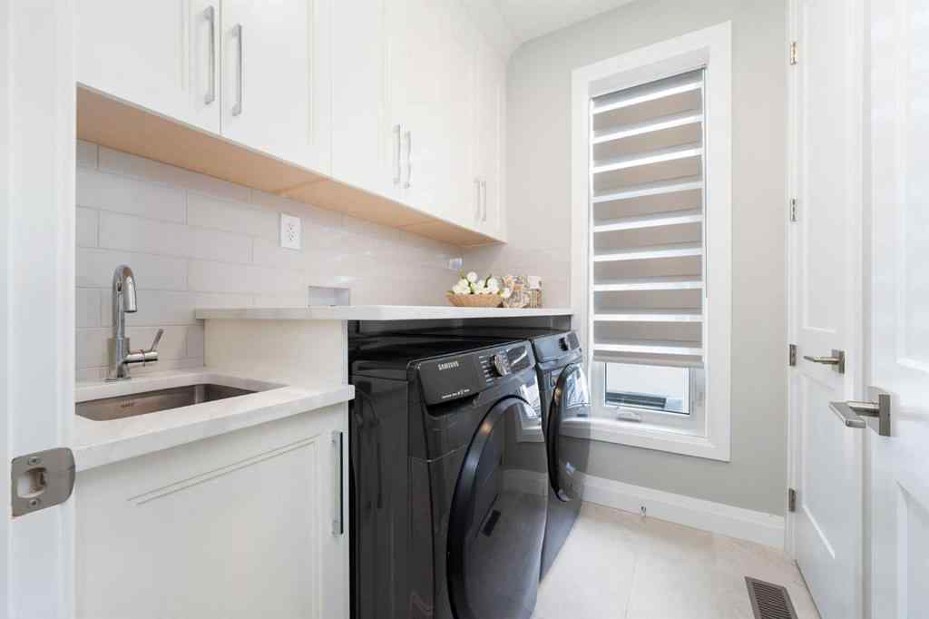 MLS® A2257227 - 128 Hampstead Mews NW in Hamptons Calgary, Residential