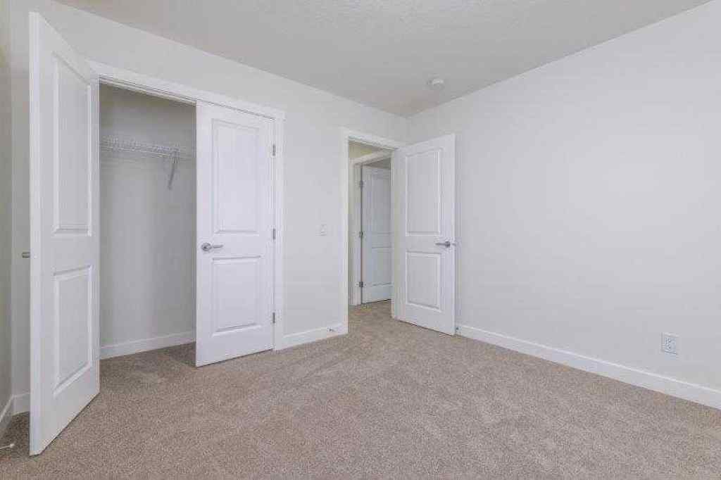 MLS® A2257233 - 33 Walcrest Lane SE in Walden Calgary, Residential