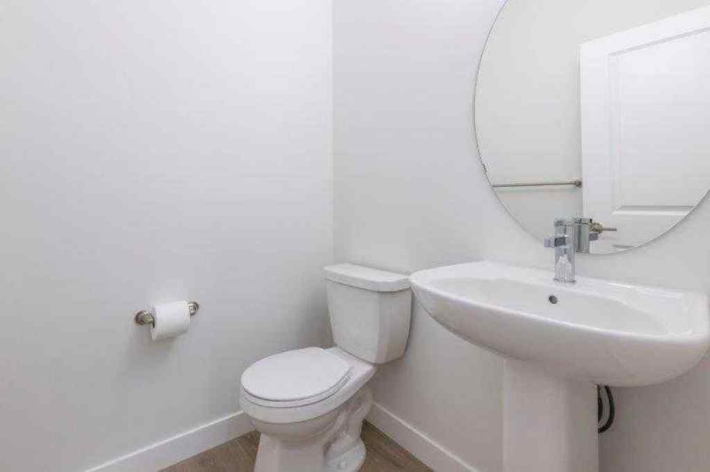 MLS® A2257233 - 33 Walcrest Lane SE in Walden Calgary, Residential