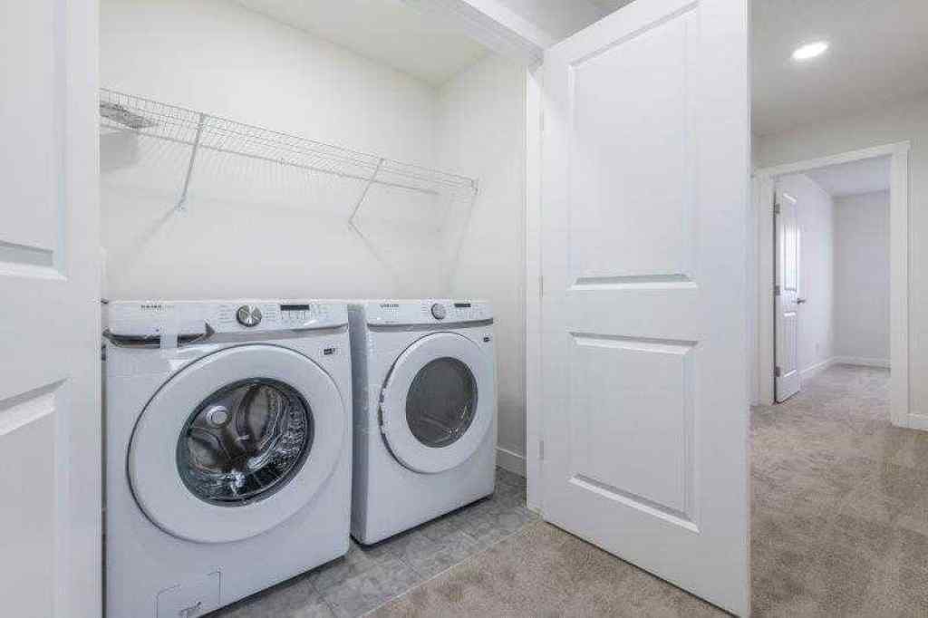 MLS® A2257233 - 33 Walcrest Lane SE in Walden Calgary, Residential