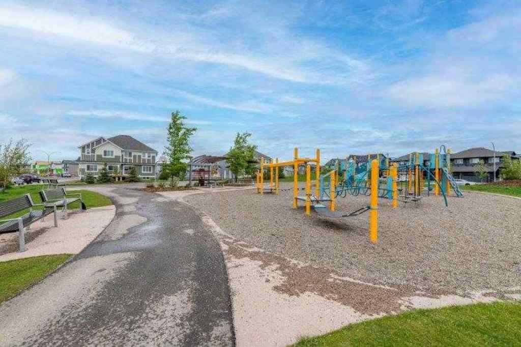 MLS® A2257233 - 33 Walcrest Lane SE in Walden Calgary, Residential