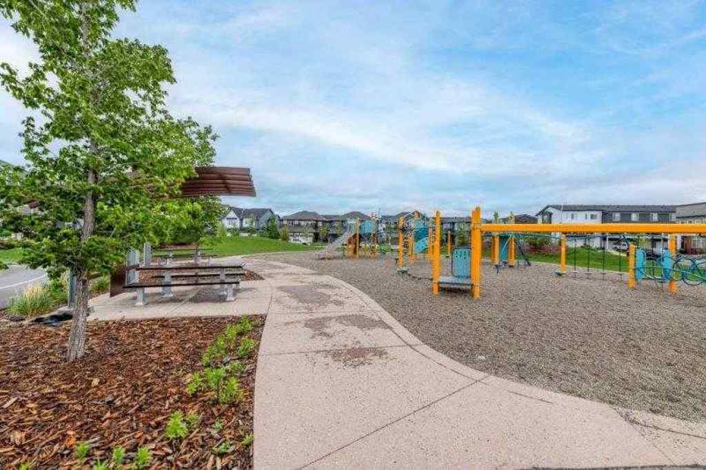 MLS® A2257233 - 33 Walcrest Lane SE in Walden Calgary, Residential