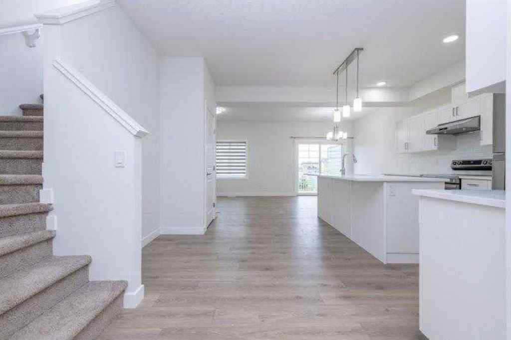 MLS® A2257233 - 33 Walcrest Lane SE in Walden Calgary, Residential