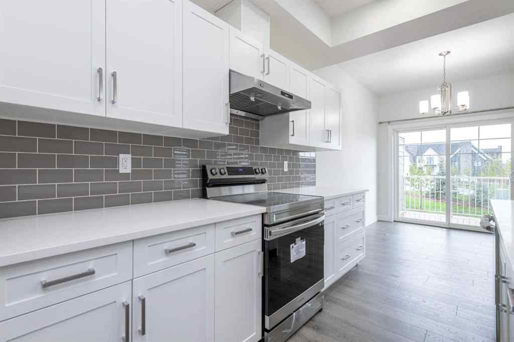 MLS® A2257233 - 33 Walcrest Lane SE in Walden Calgary, Residential