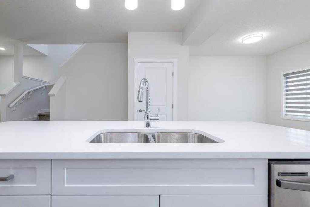 MLS® A2257233 - 33 Walcrest Lane SE in Walden Calgary, Residential