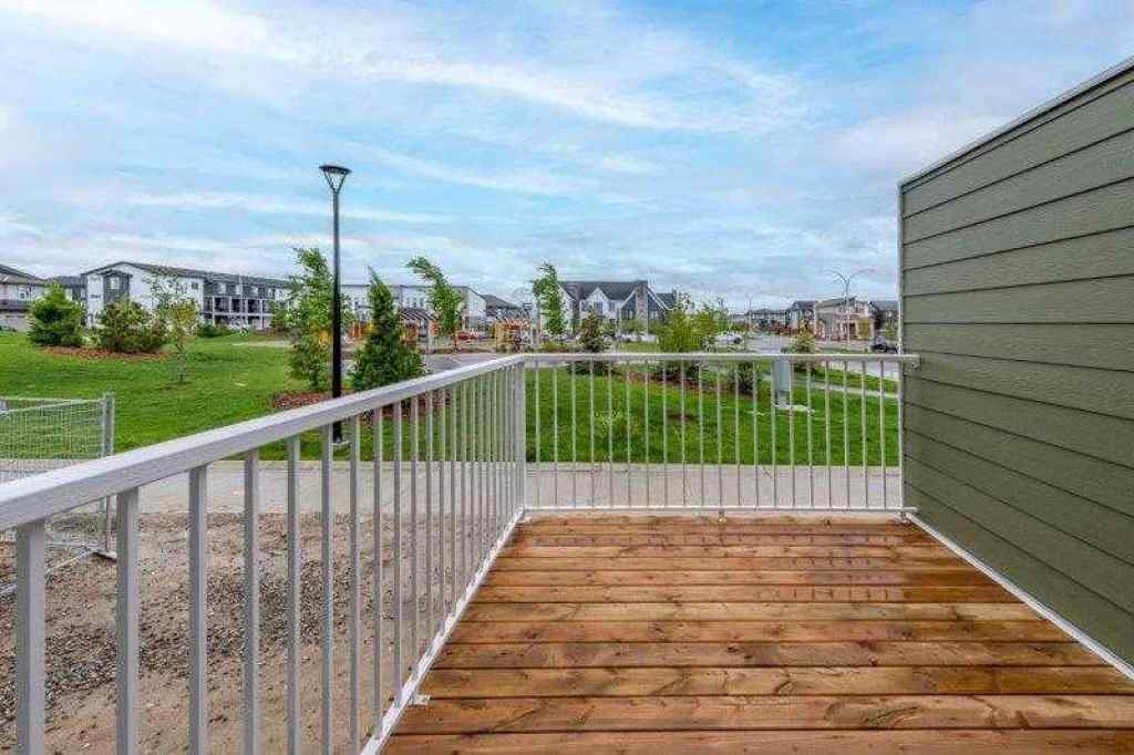 MLS® A2257233 - 33 Walcrest Lane SE in Walden Calgary, Residential