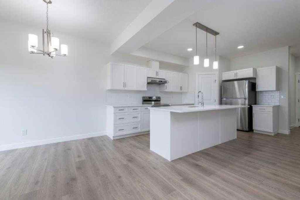 MLS® A2257233 - 33 Walcrest Lane SE in Walden Calgary, Residential