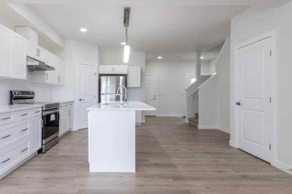 MLS® A2257233 - 33 Walcrest Lane SE in Walden Calgary, Residential