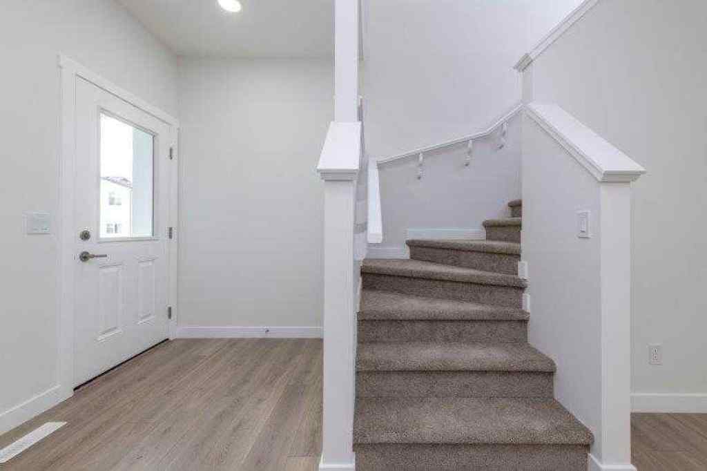 MLS® A2257233 - 33 Walcrest Lane SE in Walden Calgary, Residential