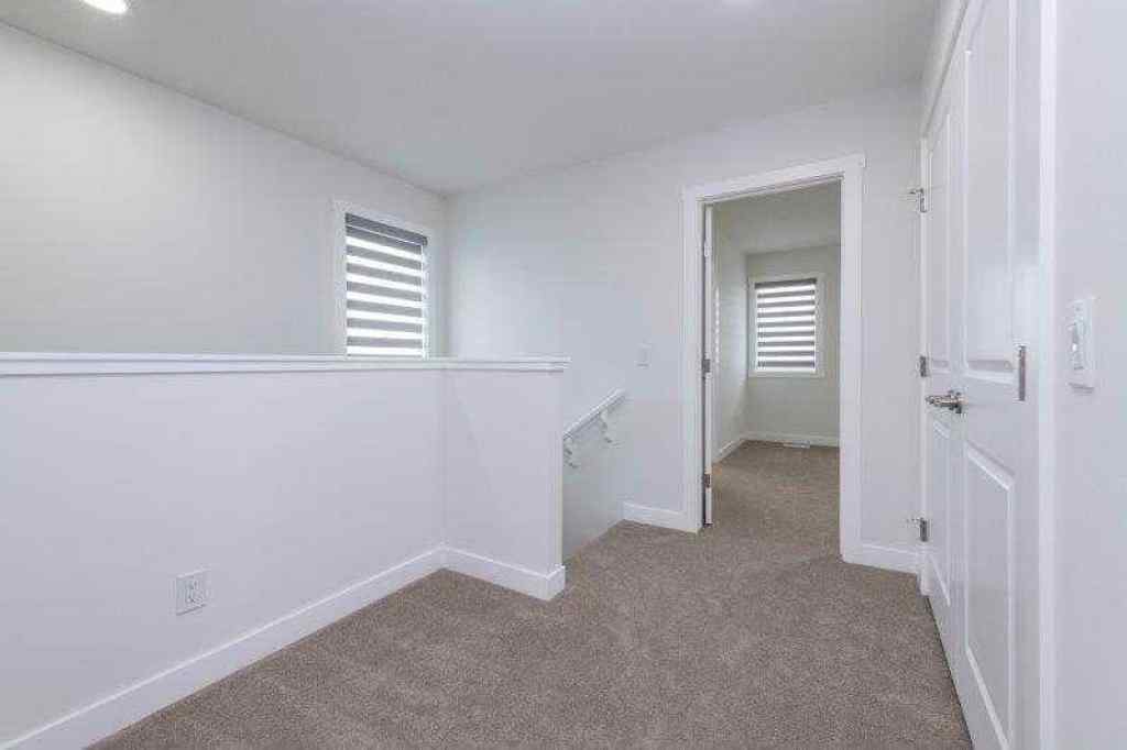 MLS® A2257233 - 33 Walcrest Lane SE in Walden Calgary, Residential