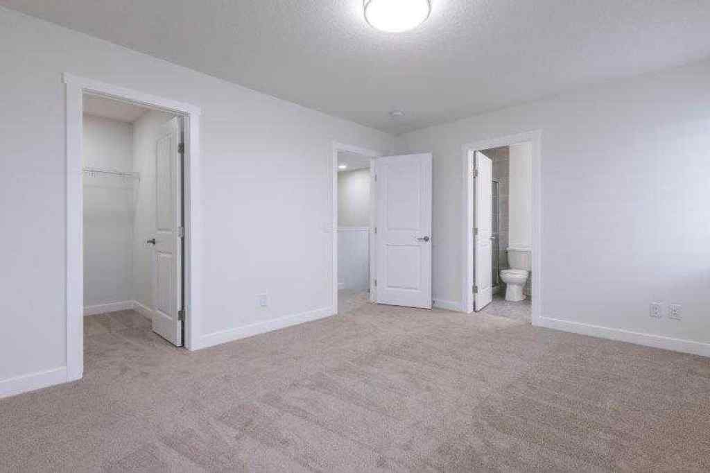 MLS® A2257233 - 33 Walcrest Lane SE in Walden Calgary, Residential