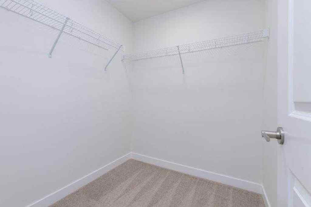 MLS® A2257233 - 33 Walcrest Lane SE in Walden Calgary, Residential