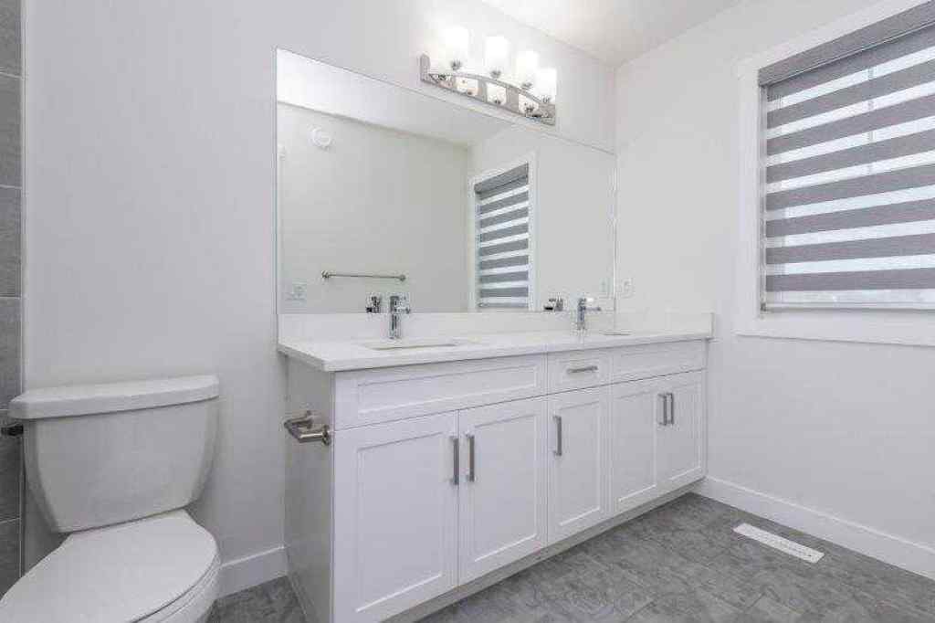 MLS® A2257233 - 33 Walcrest Lane SE in Walden Calgary, Residential