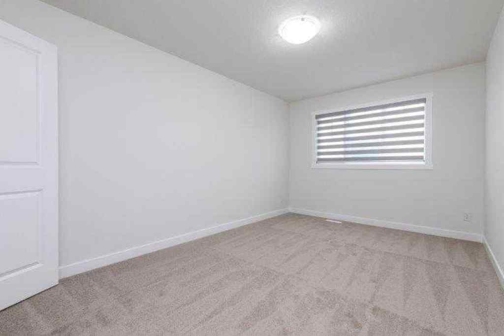MLS® A2257233 - 33 Walcrest Lane SE in Walden Calgary, Residential