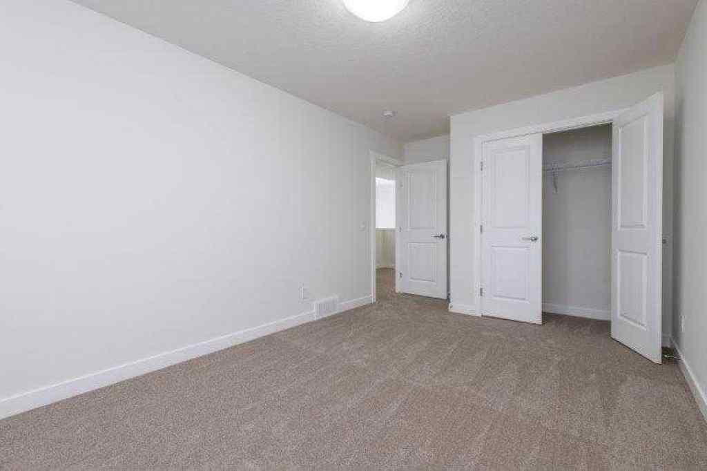 MLS® A2257233 - 33 Walcrest Lane SE in Walden Calgary, Residential