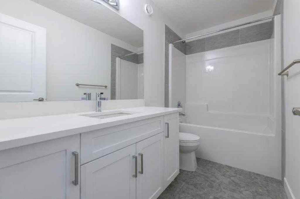MLS® A2257233 - 33 Walcrest Lane SE in Walden Calgary, Residential
