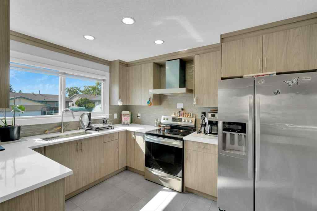 MLS® A2257249 - 208 Maddock Way NE in Marlborough Park Calgary, Residential