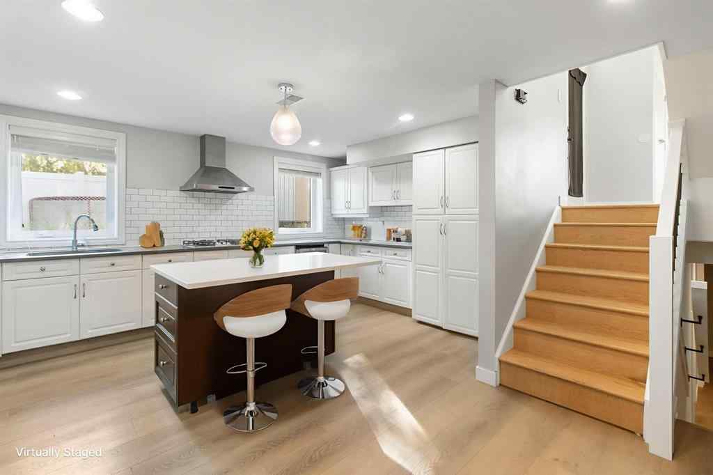 MLS® A2257295 - 4 Heston Street NW in Highwood Calgary, Residential
