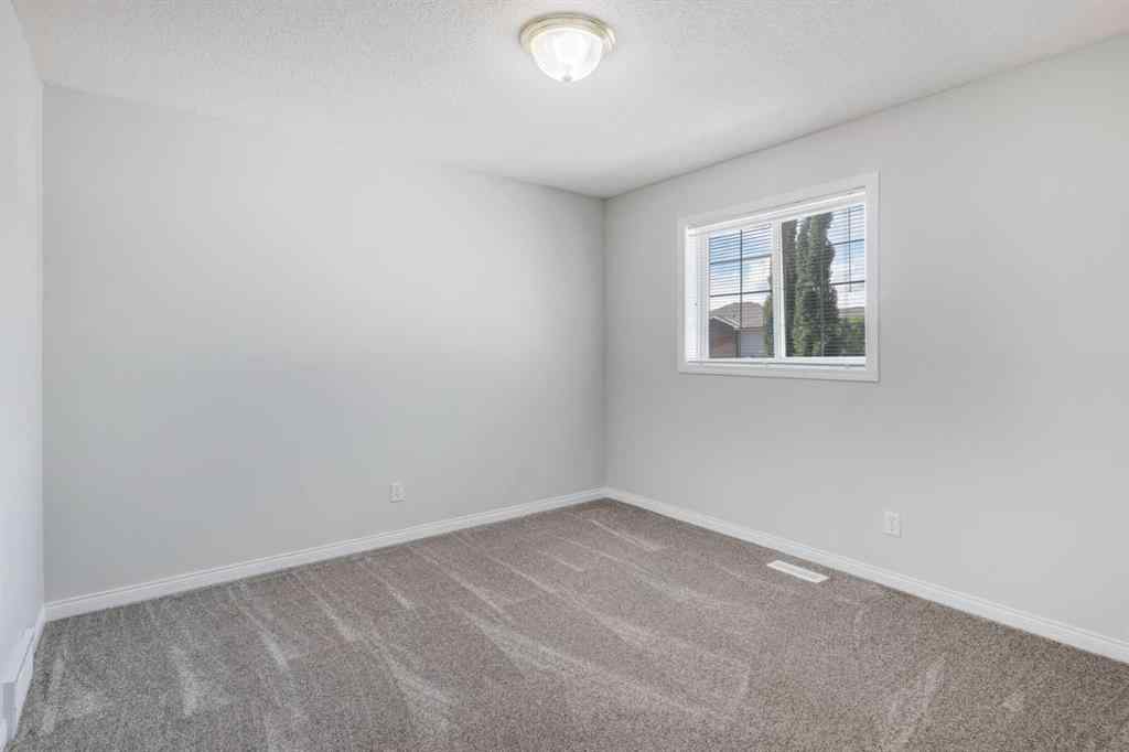 MLS® A2257305 - 26 Rocky Ridge Heights NW in Rocky Ridge Calgary, Residential