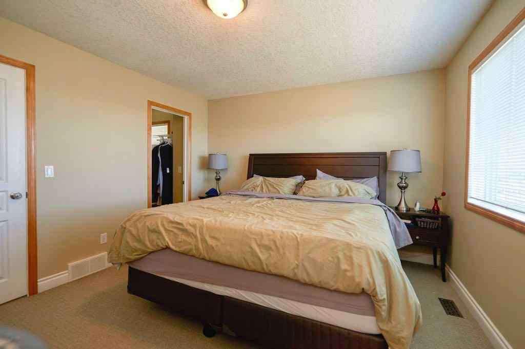 MLS® A2257338 - 24 Cougar Ridge Mews SW in Cougar Ridge Calgary, Residential