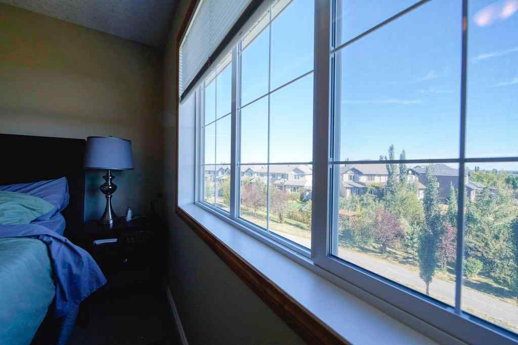 MLS® A2257338 - 24 Cougar Ridge Mews SW in Cougar Ridge Calgary, Residential