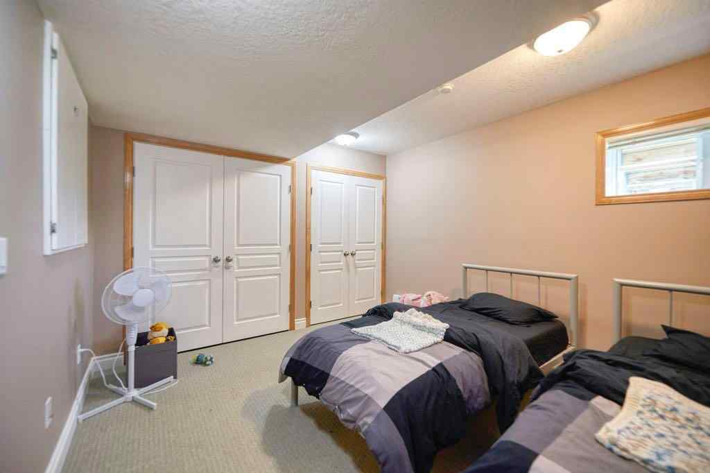 MLS® A2257338 - 24 Cougar Ridge Mews SW in Cougar Ridge Calgary, Residential