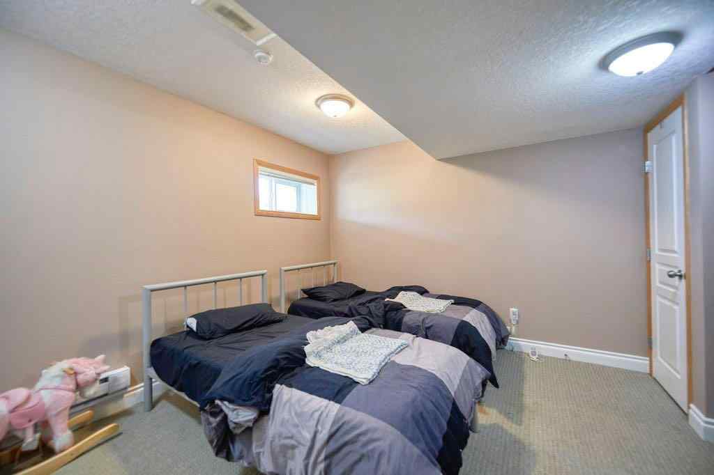 MLS® A2257338 - 24 Cougar Ridge Mews SW in Cougar Ridge Calgary, Residential