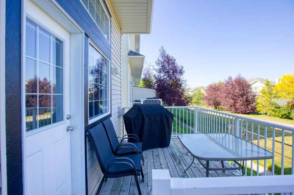 MLS® A2257338 - 24 Cougar Ridge Mews SW in Cougar Ridge Calgary, Residential