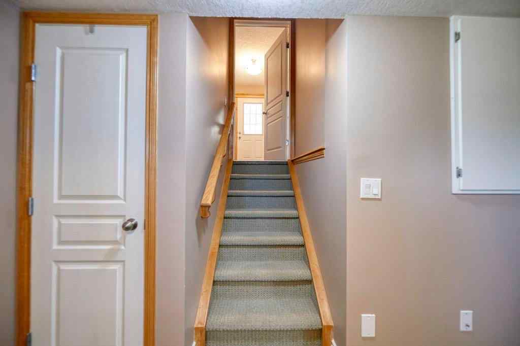 MLS® A2257338 - 24 Cougar Ridge Mews SW in Cougar Ridge Calgary, Residential